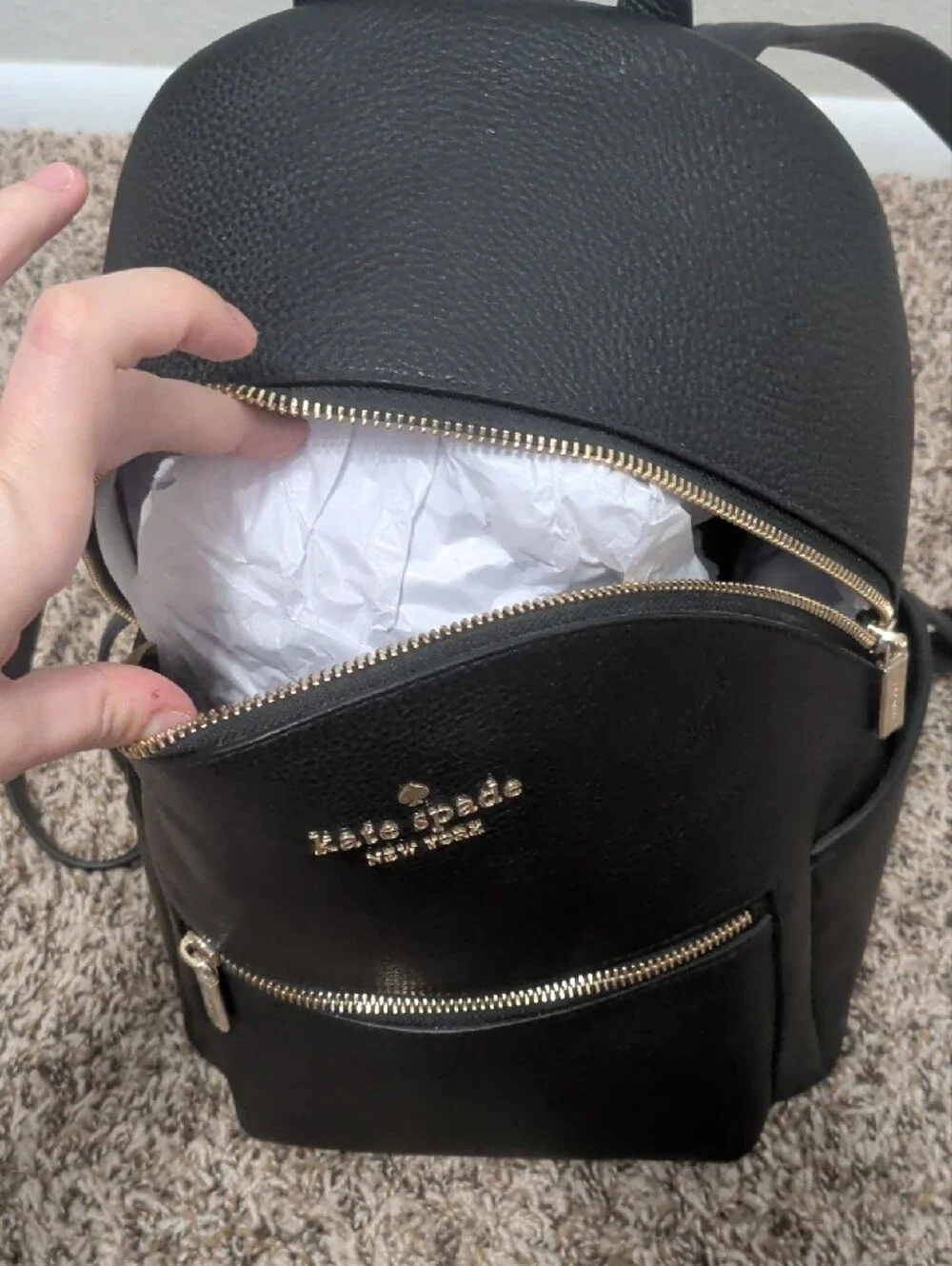 Kate Spade Leila black pebbled leather medium dome backpack with gold hardware